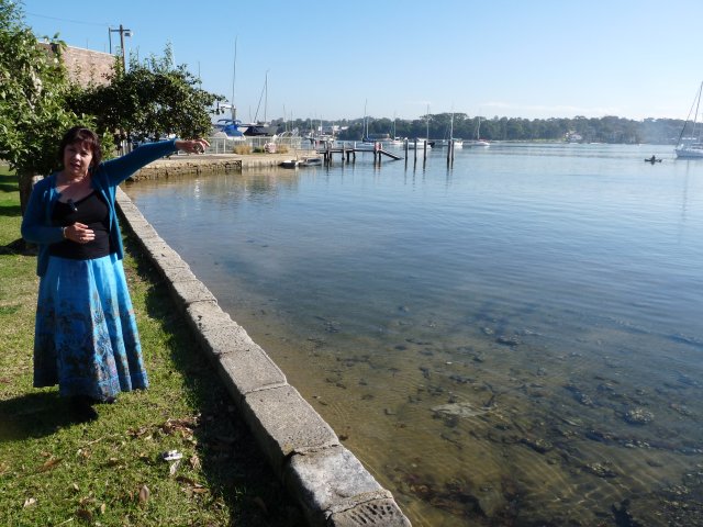 Karen Maber pointing out Carrs Park across Kogarah Bay